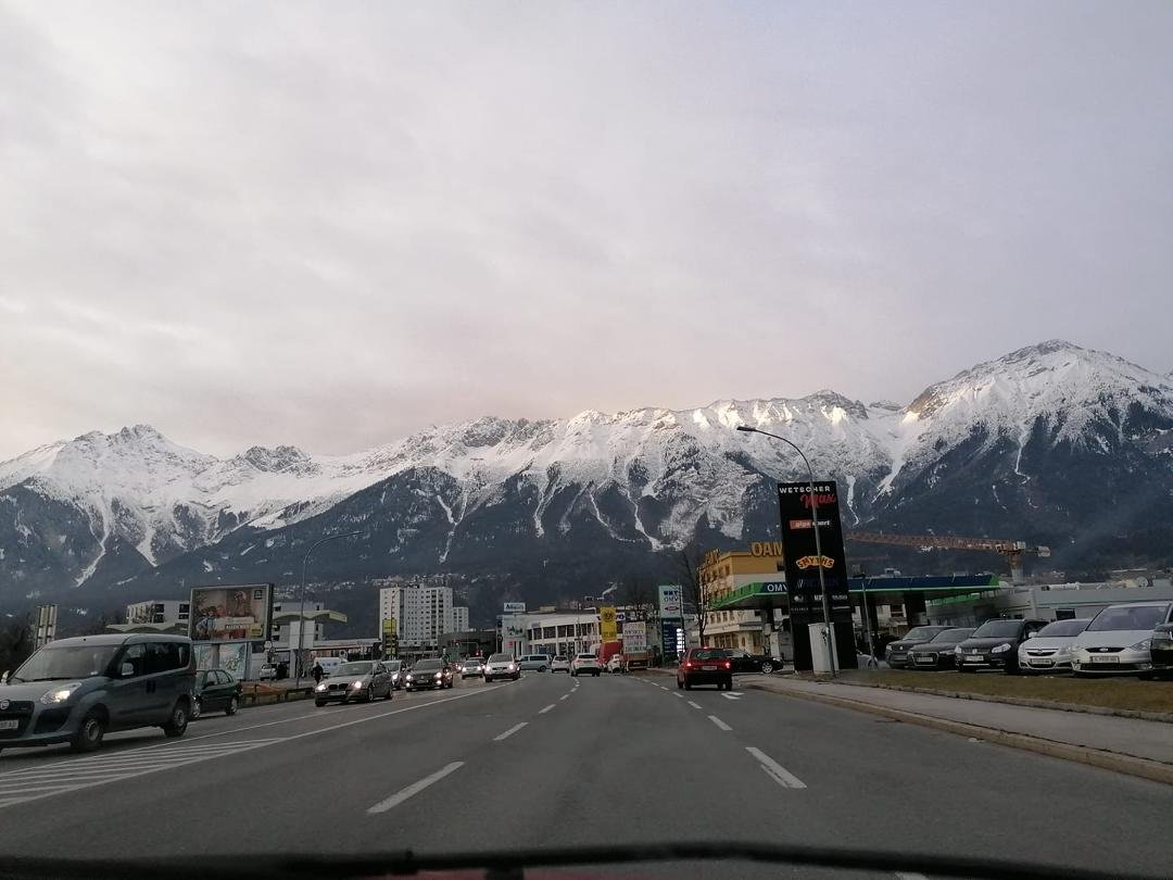 Innsbruck, Austria I was there twice in 1974, the second time right before Christmas. The most beautiful place that I have ever been to.