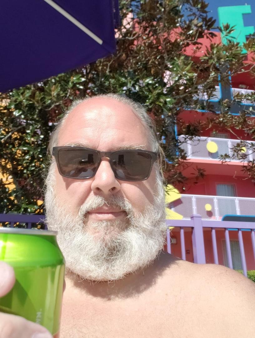Sun King in Paradise drinking a Pina Colonic