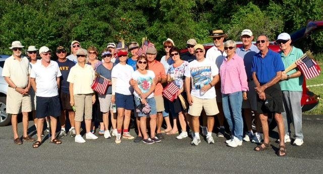 On Sunday morning of Memorial Day weekend we joined 24 of our neighborhood friends and headed over to The Bushnell National Cemetery to place flags for each headstone in section A. The cemetery holds 147,000 veterans and sp