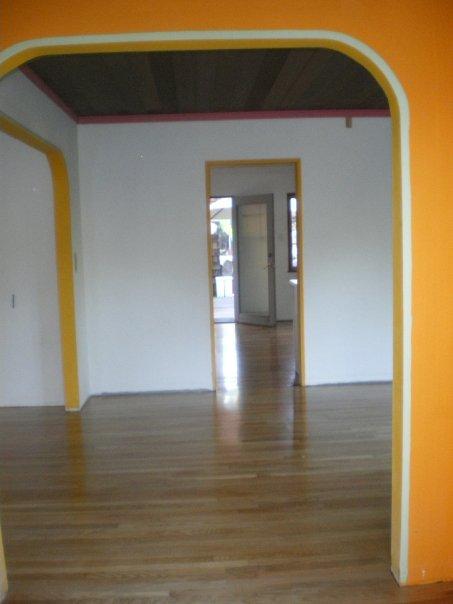 From front door towards kitchen and back door