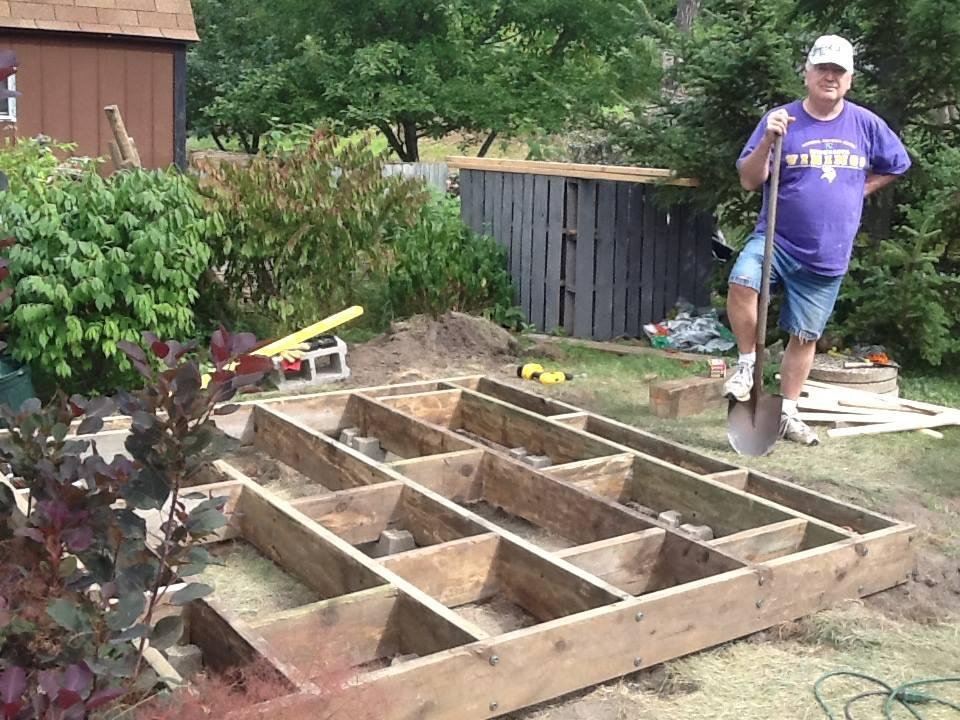 Barb's work. I'm a helper leaning on my shovel.