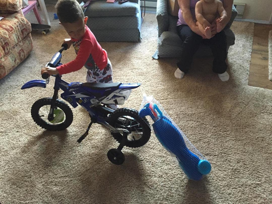 Jackson taking his golf clubs with him on his new bike.