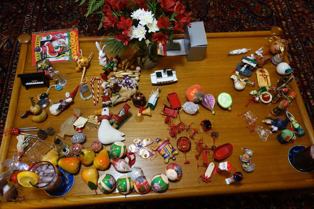 Diane Robitelle Here is a picture of our ornaments....poor pears are 48 years old (yellow and blush red down toward bottom left. And right above them are two geese: one is white cloth, the other a wood goose, with the ori
