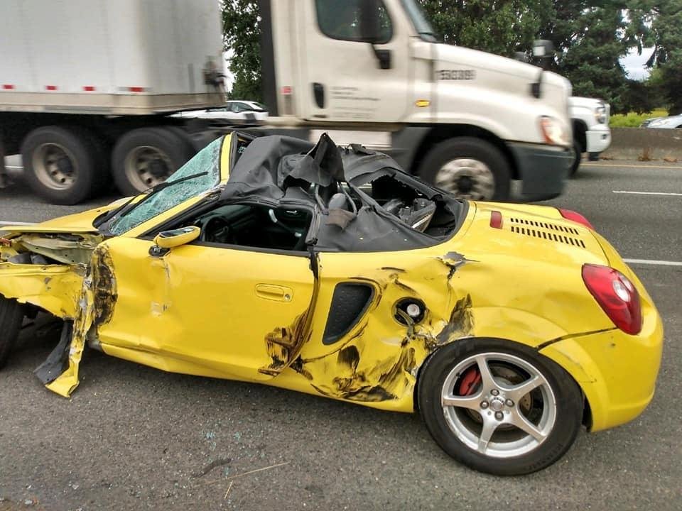 This is my nephew Beau's car after he got side swiped by a semi, he's okay! Miracle's do happen