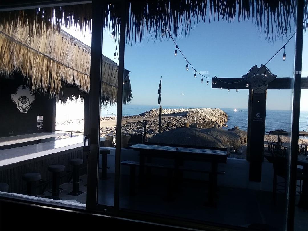 Looking out the window of the wrecked Reef at Rocky Point looking at the pier they've been working on 5 years