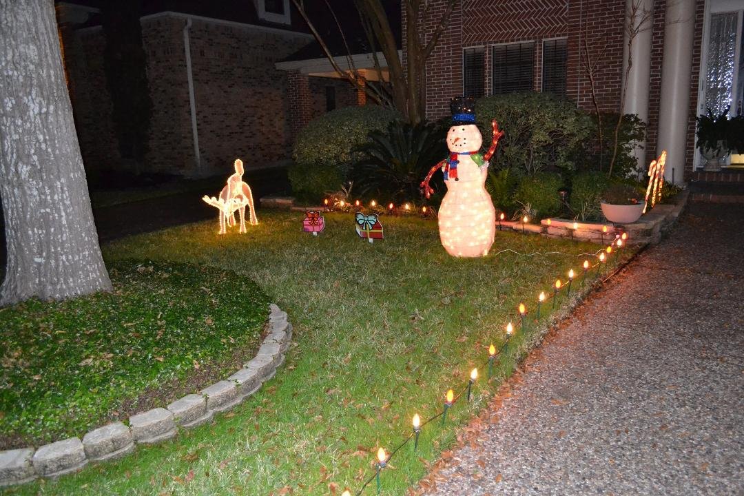 Snowman is up and waving.