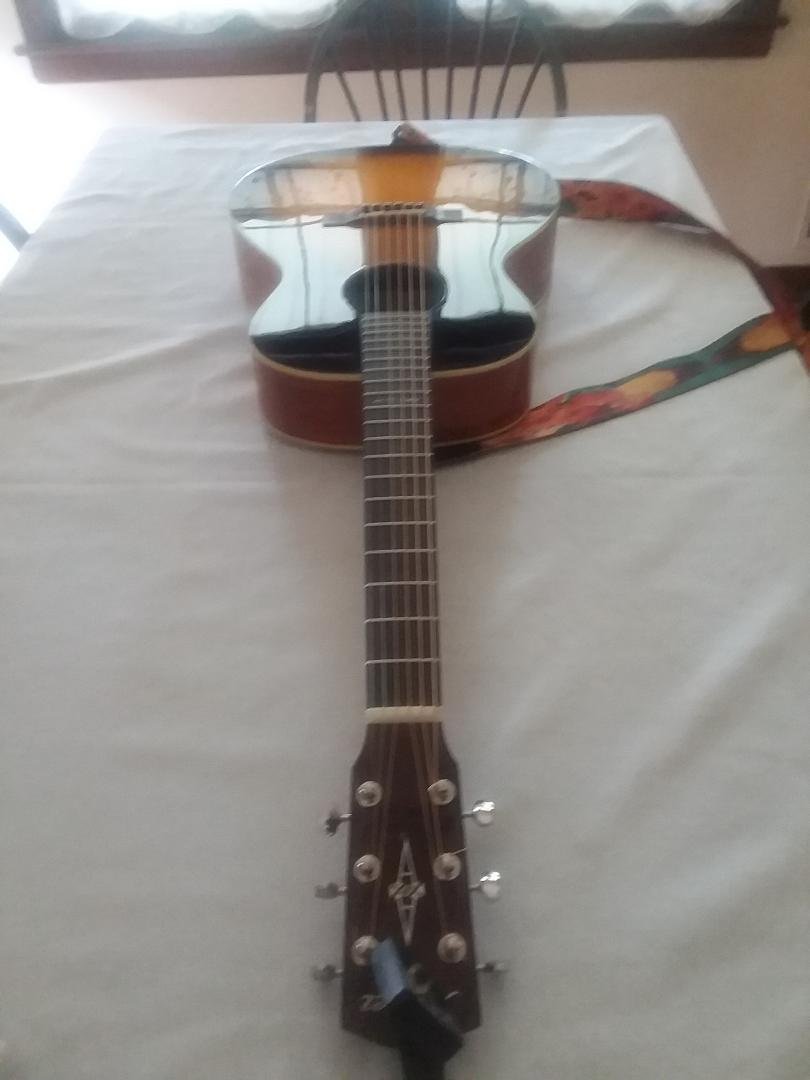Martin strings on an Alvarez guitar.  They said it couldn't be done.