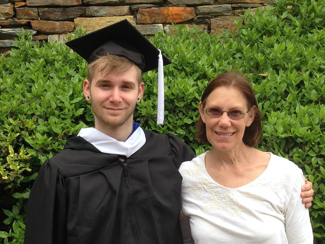 The proud graduate and his even prouder mother.