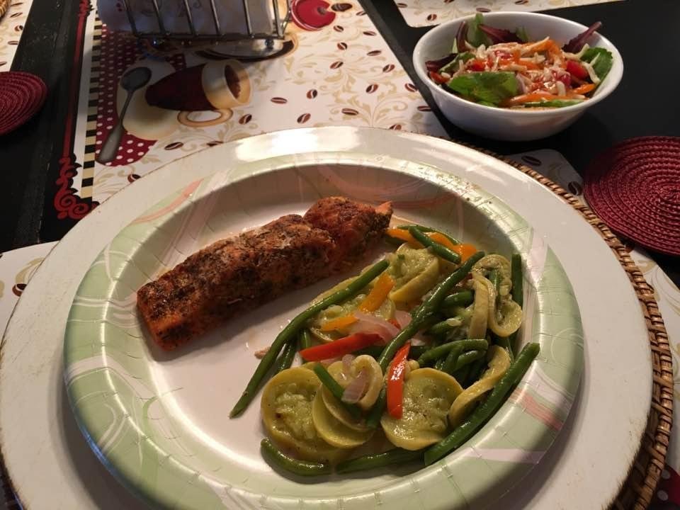 Steelhead smoked trout with yellow squash, onions, peppers and French green beans medley. Side salad of baby romaine and veggies with roasted red pepper Italian dressing