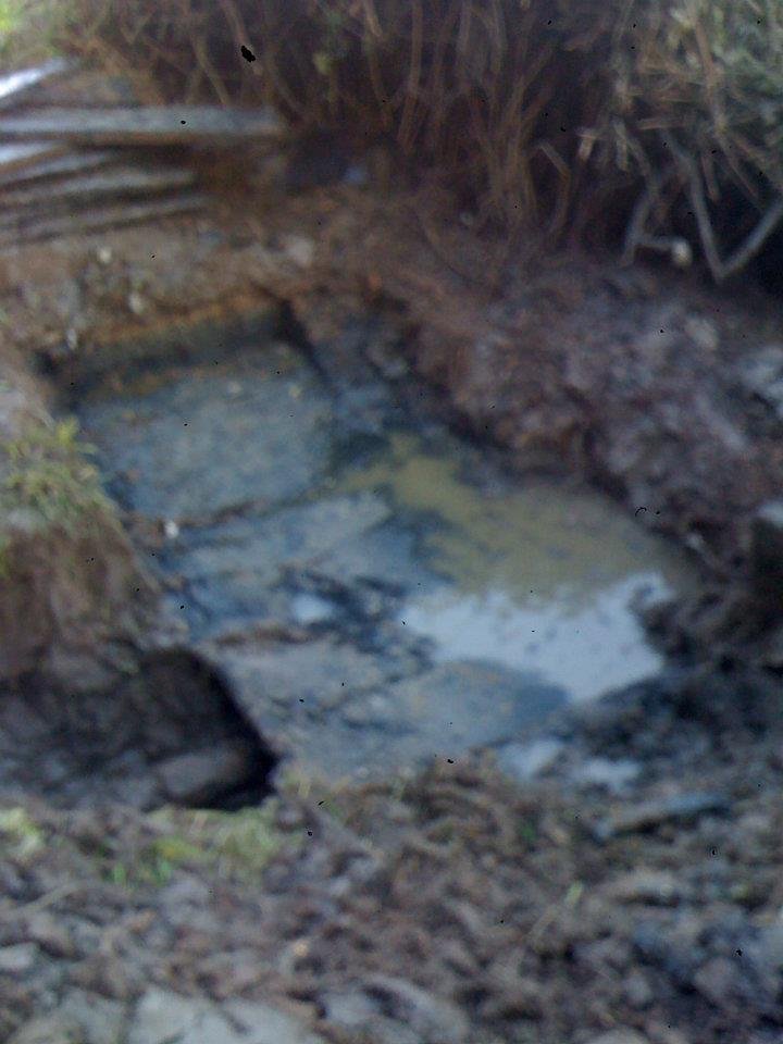 old redwood septic tank has failed and filled up