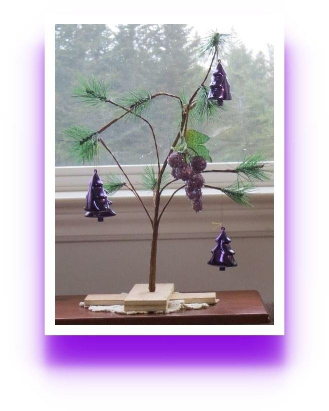 Yesterday, Bruce brought in our two artificial trees from the barn....only to find out that our two one year old Kittens, who DID NOT bother the trees last year, LOVE gnawing on the artificial needles this year.... So this