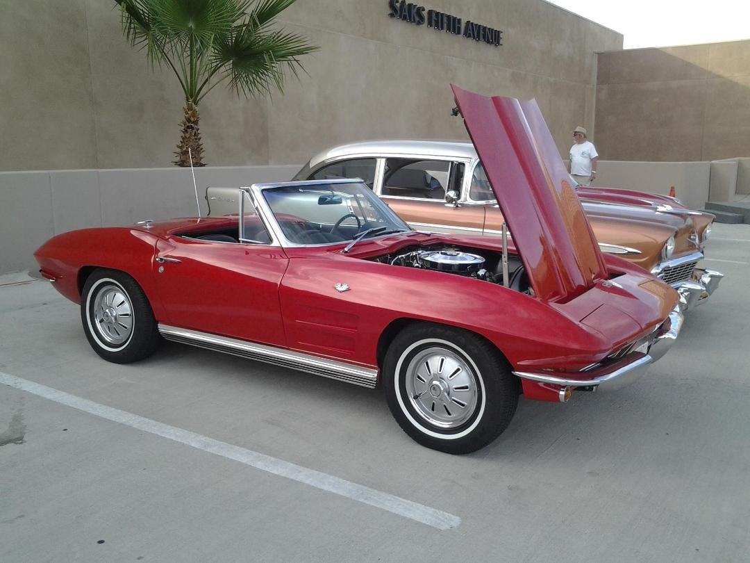 Cruise Night in Palm Desert. Boys and thier toys. The "64" vette showed well. Red was in!!!
