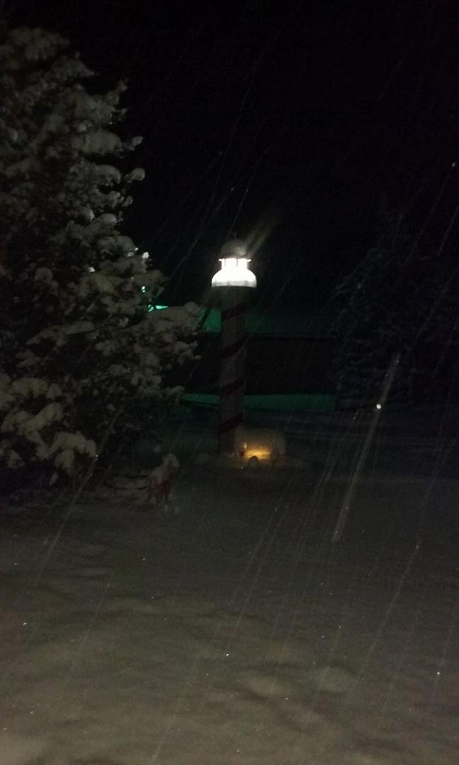 this is our lighthouse, taken with the snow still coming down, we may have 8 inches.