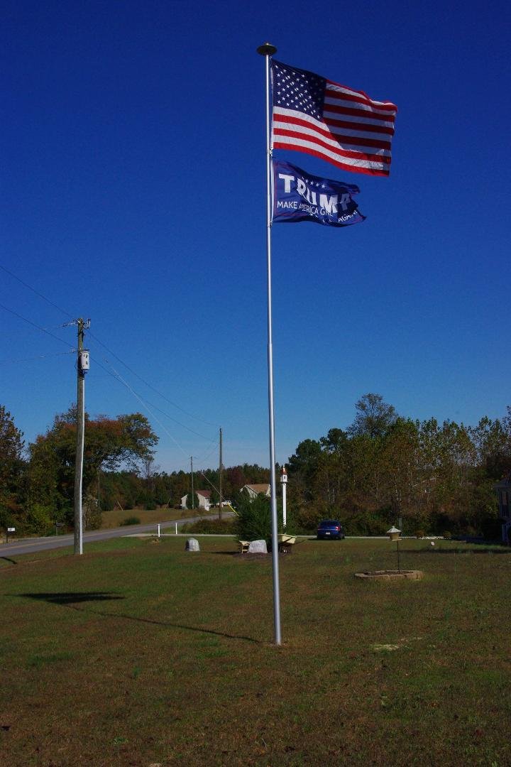 My Titan Flagpole taken just now in my front yard. Guess who I support! (Besides Titan) :-)