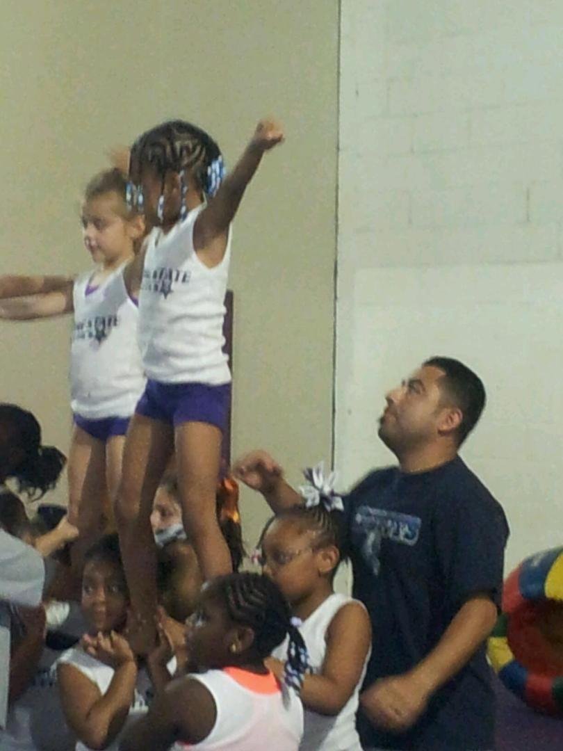 my granddaughter Ariyana doing cheerleader/gymnasium.