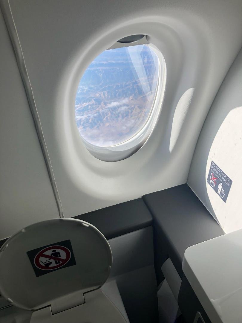 Window seat on DL. Don't know if it can be pre-reserved or not.
