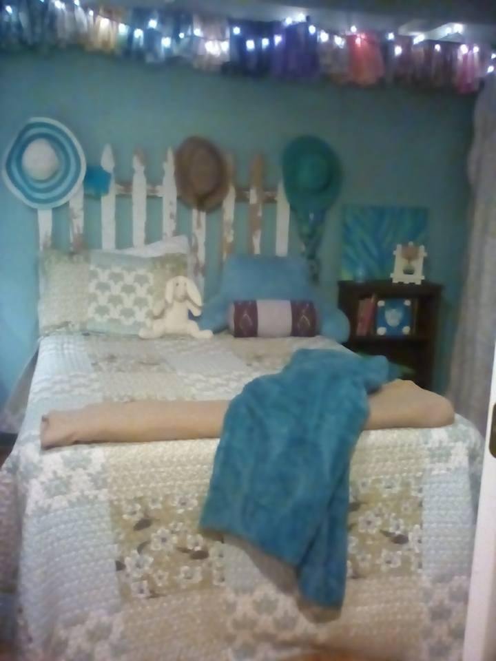 New headboard my Friend Carla and I made with a section of old fence!  Power washed it then sanded it!  Came out great!!!