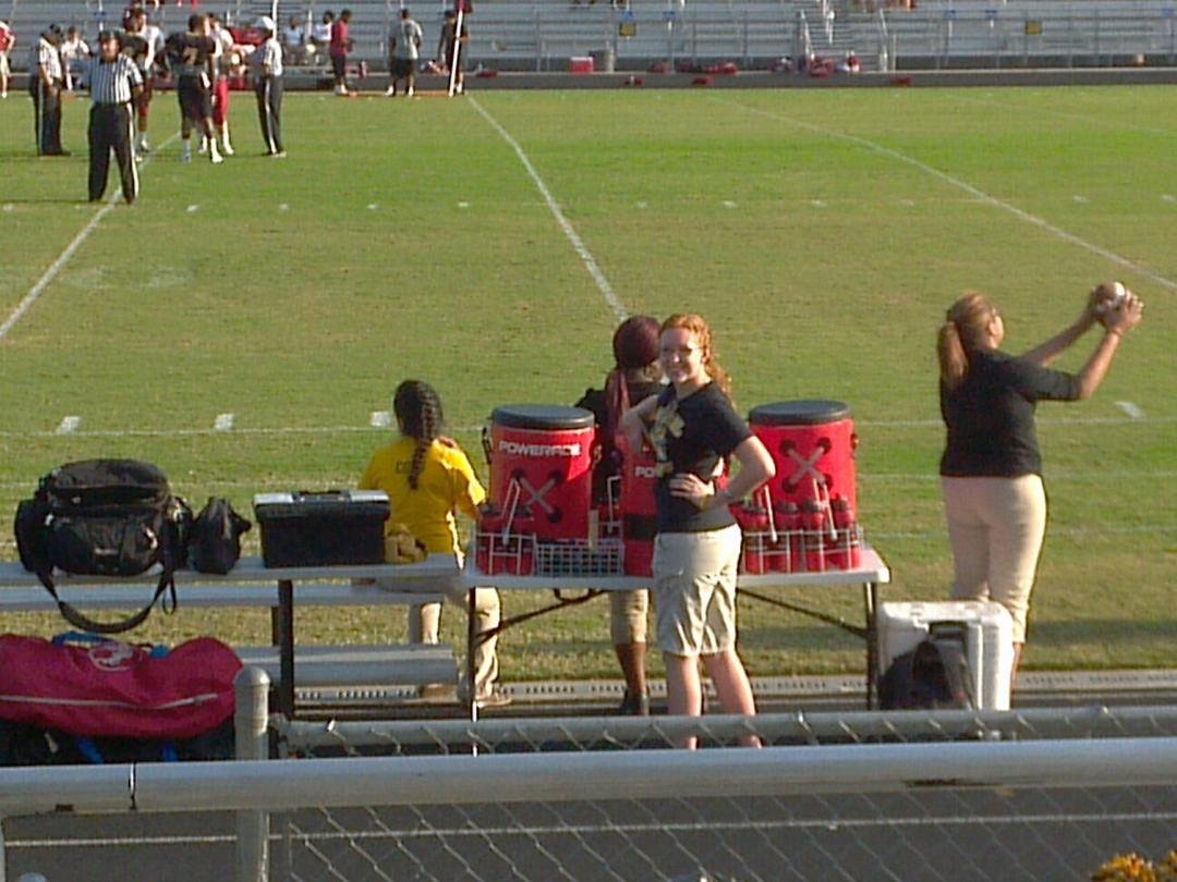 Becky working at Central Football Game.