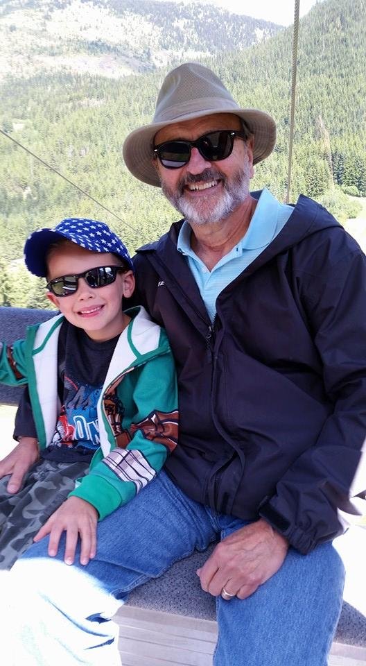 Gerry and grandson on gondola at Crystal mountain.