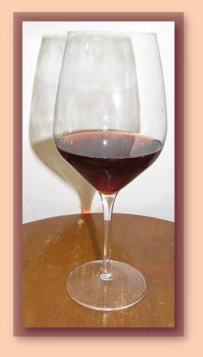 Earlier today, in what I call my "Catch All location", there were two boxes I had forgotten about...in total there were 18 bottles of Blueberry wine from 2007...YES, that is correct, 12 year old wine. I emptied them back i