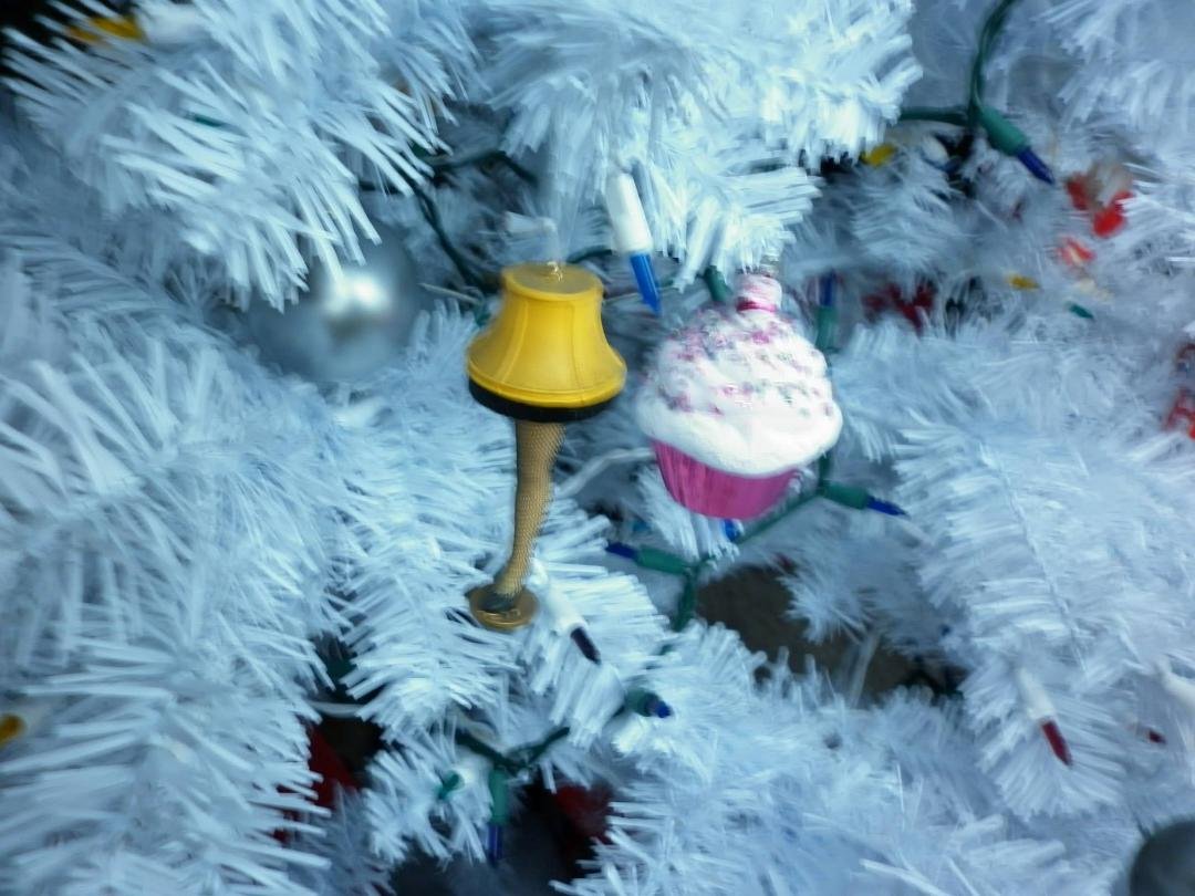 The leg lamp christmas ornament for James Woods,,,the cupcake christmas ornament is Edna Yeager....