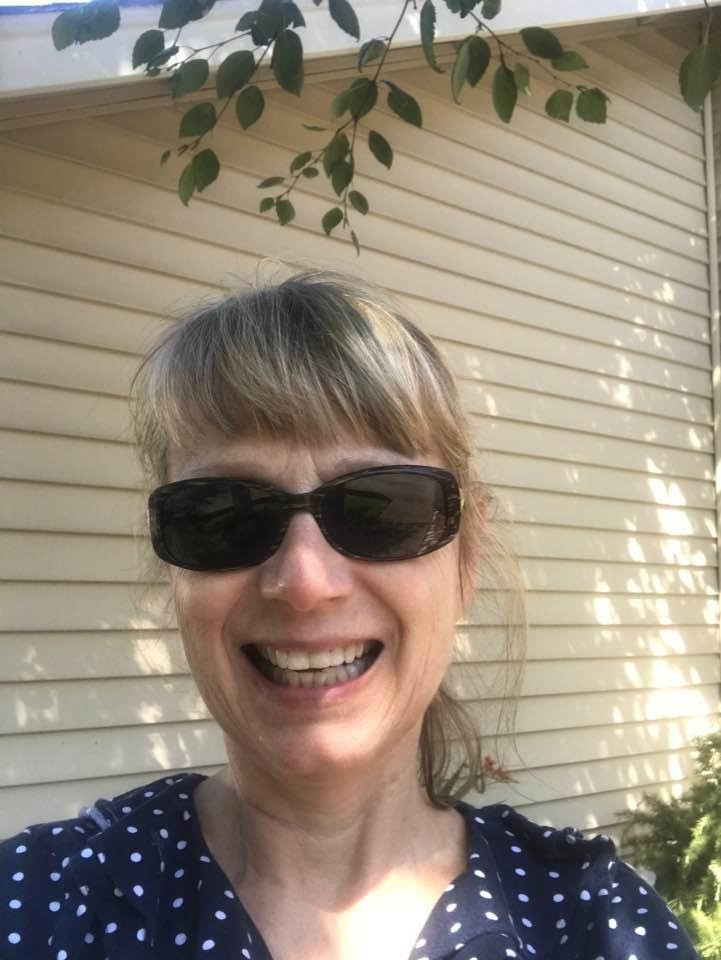 Showing off my great new crown. Betcha can't tell which one. Thank you, Dan Ries, Gresham Dentist Extraordinaire!
