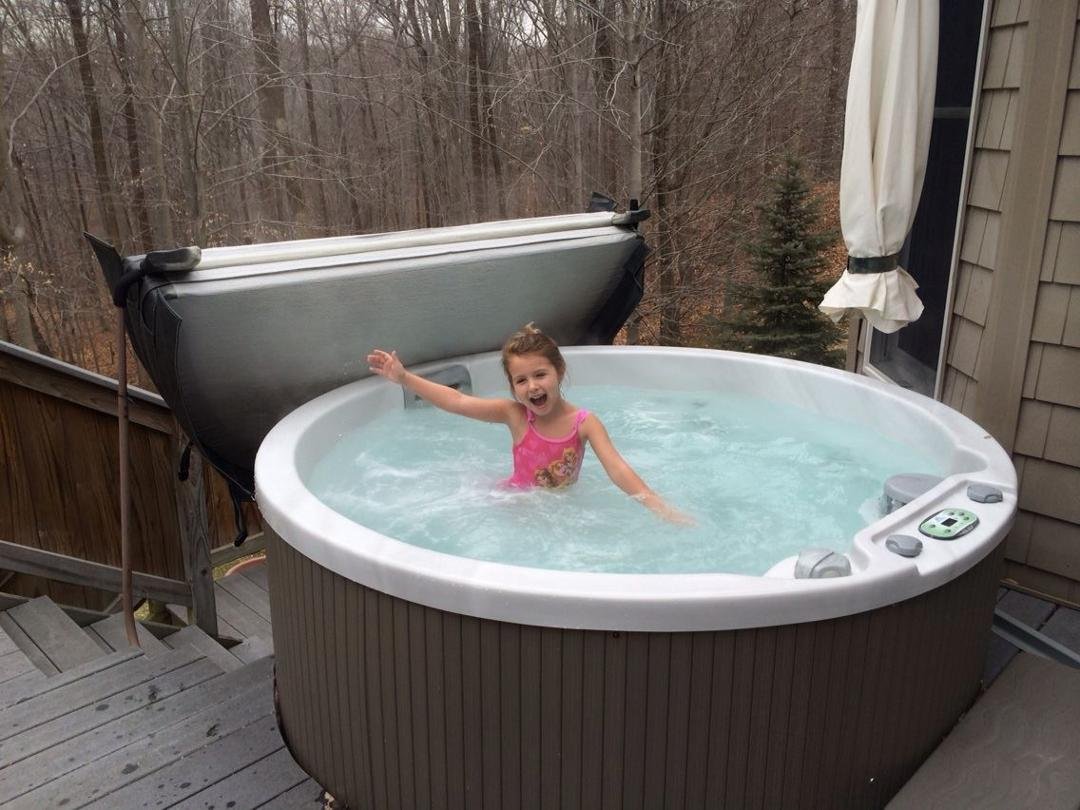 Billi loves the hot tub