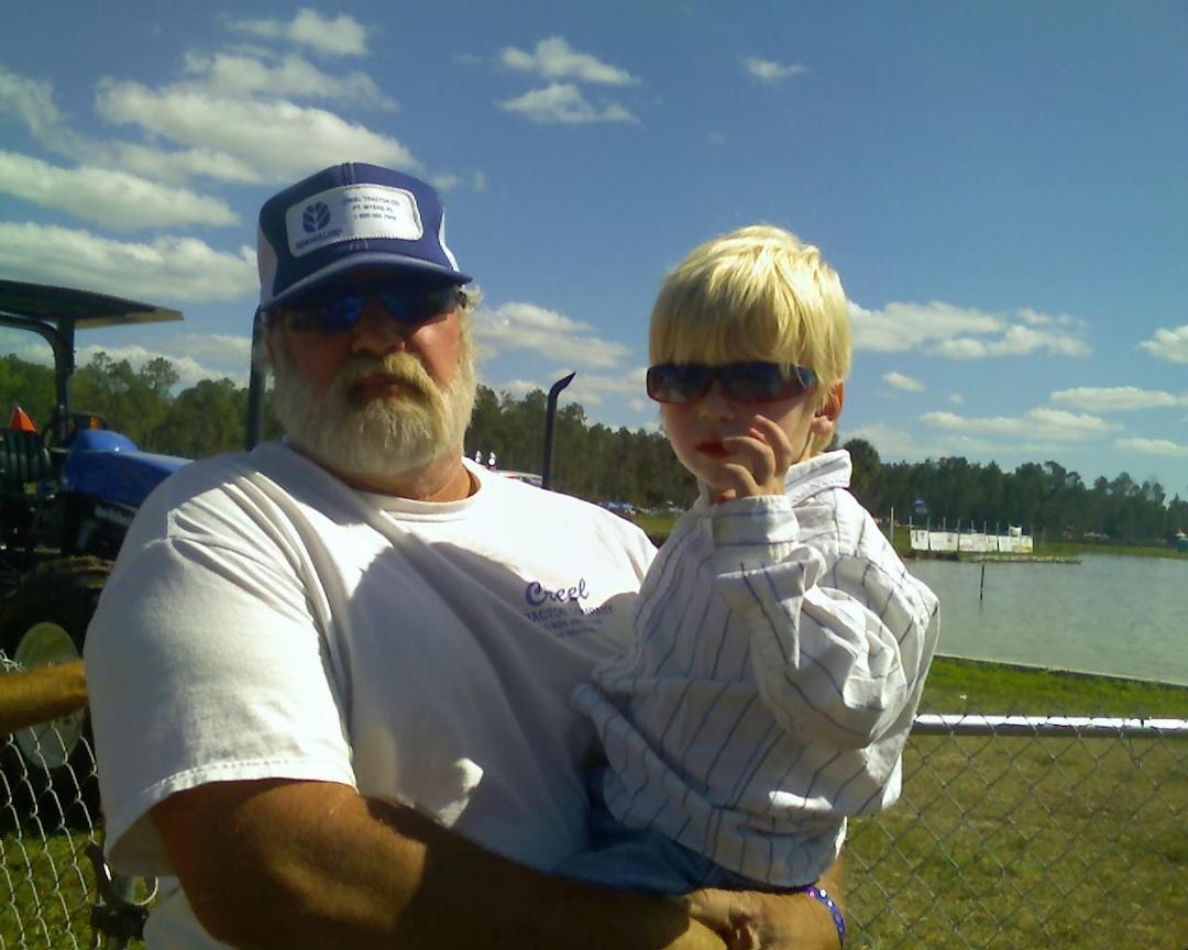 Grandpa Kurt G Miller with grandson (William) Moose Cone. swamp buggy races, Naples, Florida.