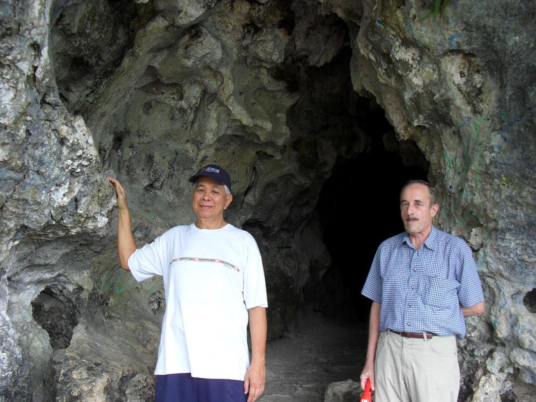 Heinz and me at the river side of Makahambas Cave, CDO after negotiating the long dark stretch of a small opening from the entrance sideof the cave.