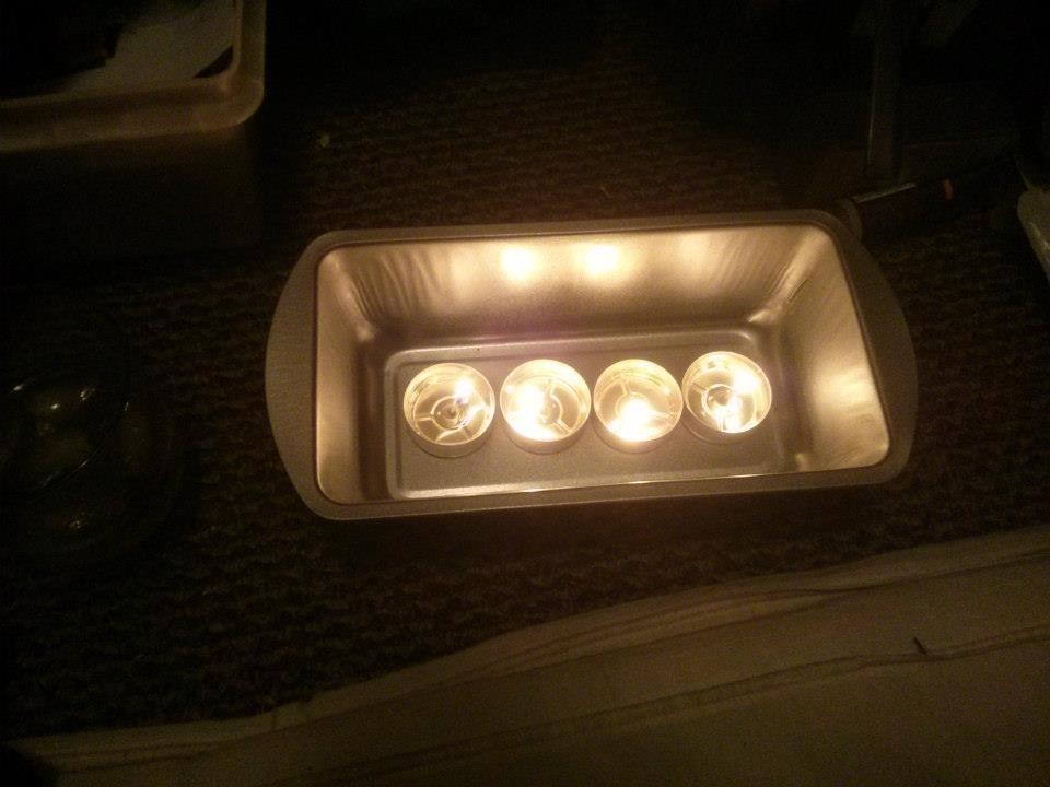 Having seen two YouTube videos on the subject I thought I'd give it a try. For both, I started with a loaf pan with four tea lights.