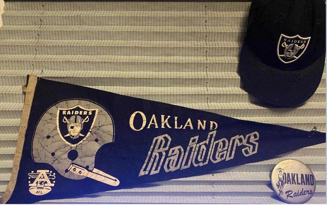 Here is my 1969 Raiders AFL pennant and a button that we bought at Oakland Alameda county stadium that day, October 19, 1969. I got the hat much later.