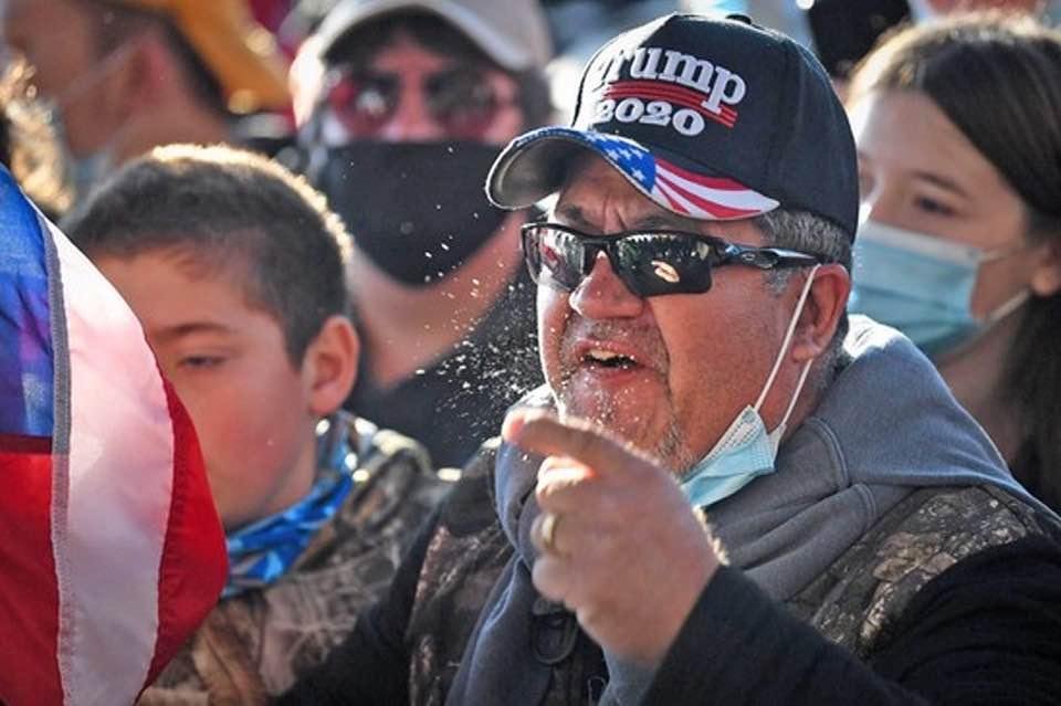 Picture taken by photojournalist Caroline Brahman on Saturday Nov 14 during the gathering in Washington, DC. Published in the Daily KOS. Picture speaks for itself. Wear your mask.