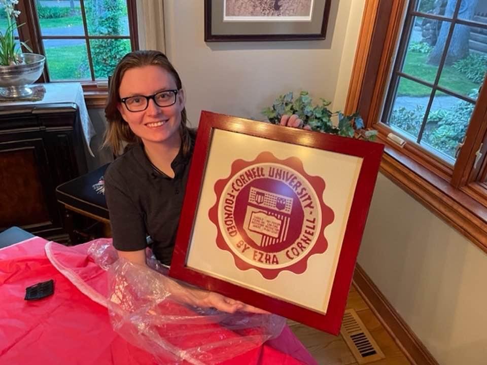 Sarah 2023 Cornell University grad with gift from Cathy