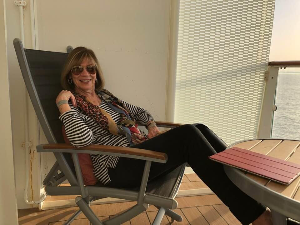 Rosemary enjoying a warm day on the veranda of the cruise ship as we head back to South Hampton to fly home.