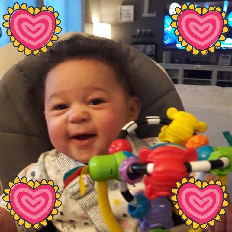 Autumn enjoying her new high chair