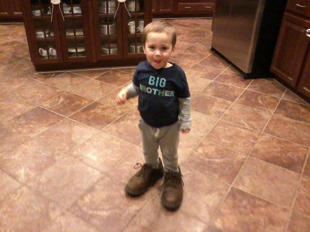 Had a great dinner with Karen and Rob, Ryan and Elizabeth. Ryan decided he preferred to walk around in my shoes. Not quite ready.