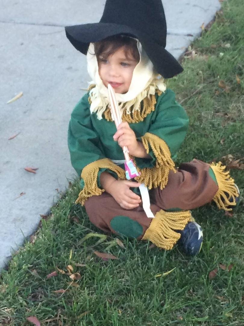 Grandson Zach - cutest scarecrow enjoying Halloween!