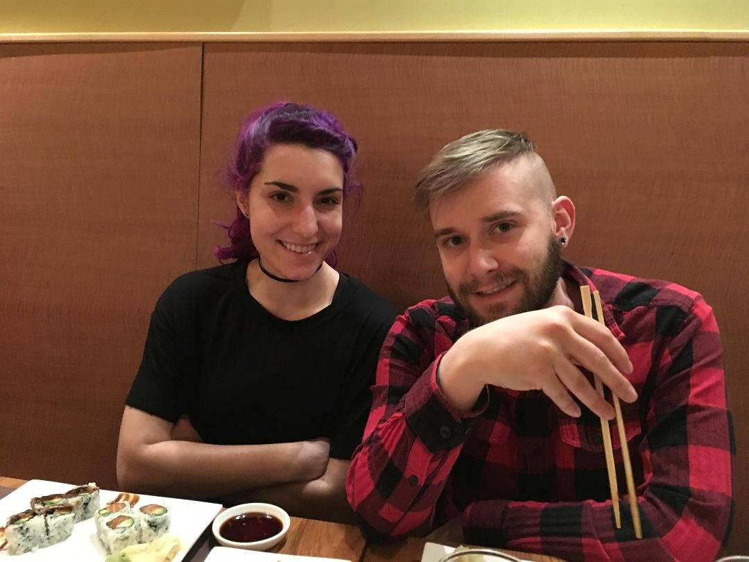 My son Mark and his girlfriend Gina. I did not sanction Mark's haircut.
