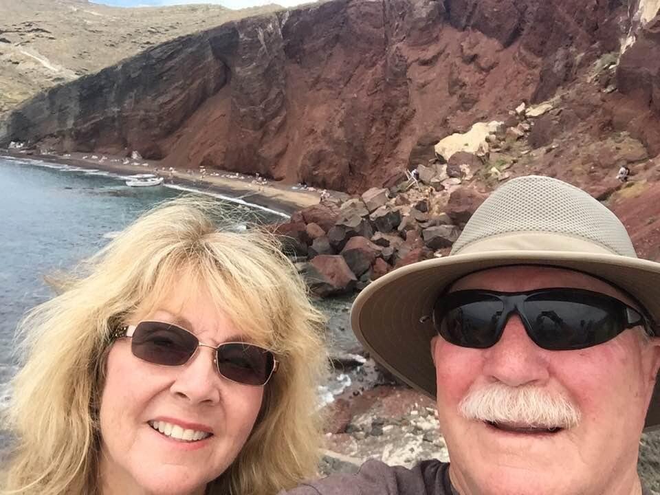 Before climbing down to the red sand beach