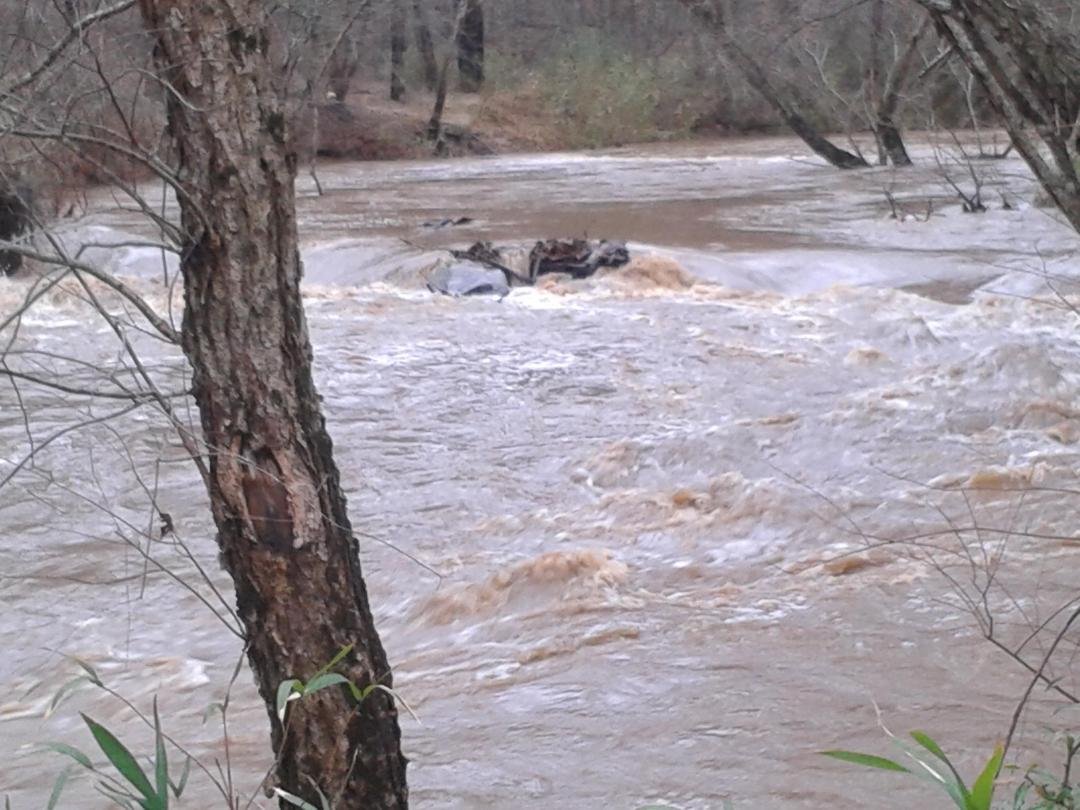 Commissioners Creek behind the house. Usually just sand and large rocks.