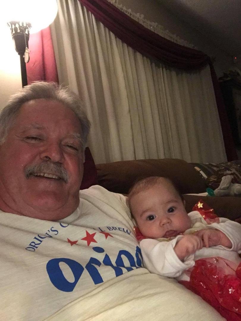 Chillin with my newest granddaughter Parker, God had really blessed me, and what’s her name, Christmas is good!