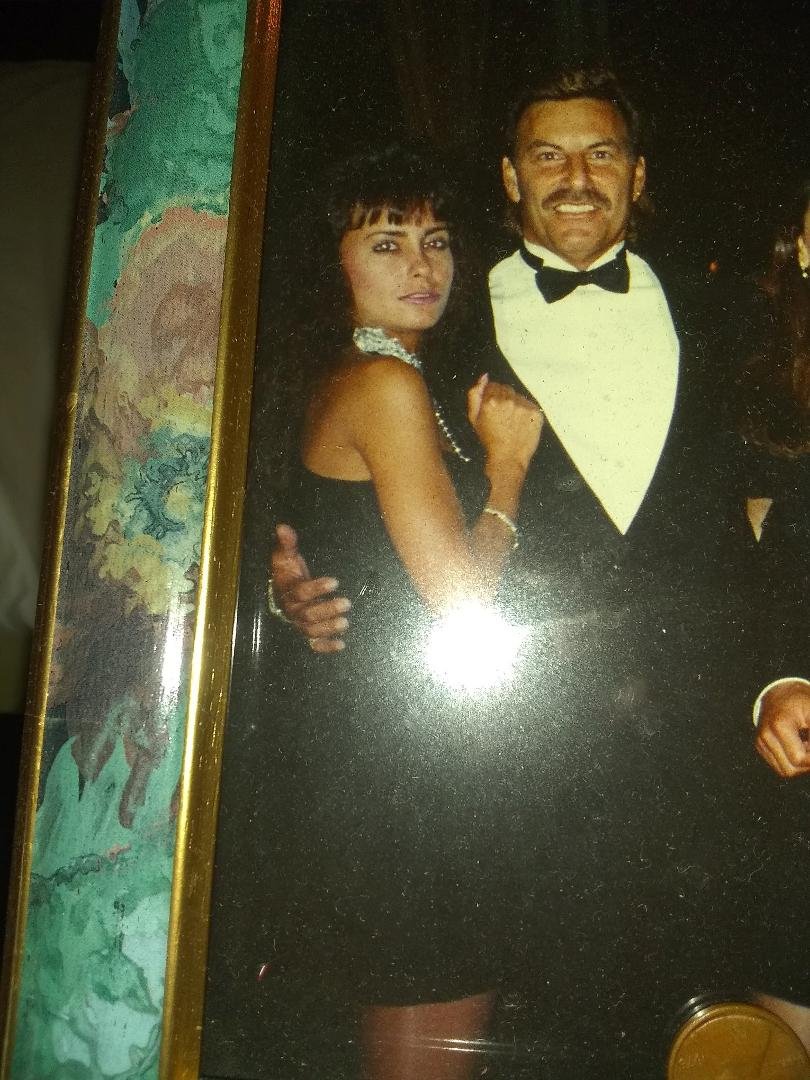 was talking to wifey number one here on fb and while talking came across the only pic i have of wifey number 3 at my parents 50th anniversary party which btw was at top of the world where i got married to wifey number 1 lik