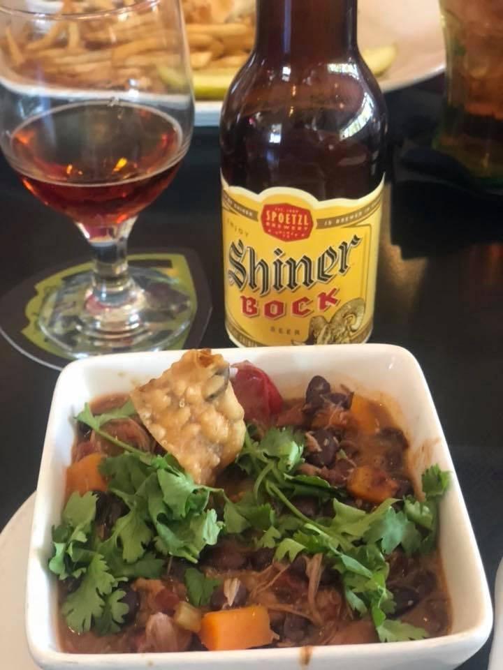Having duck chili and a Shiner Bock