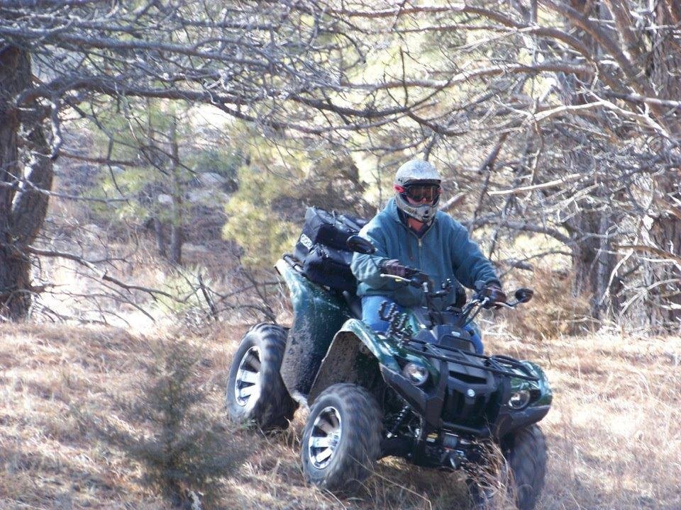 I was just going over my atv pictures and noticed a trend happening. If you all notice brother Tim can't seem to keep his 4-wheeler from being stuck or in the upright position. But if you notice I am a lot more accomplished