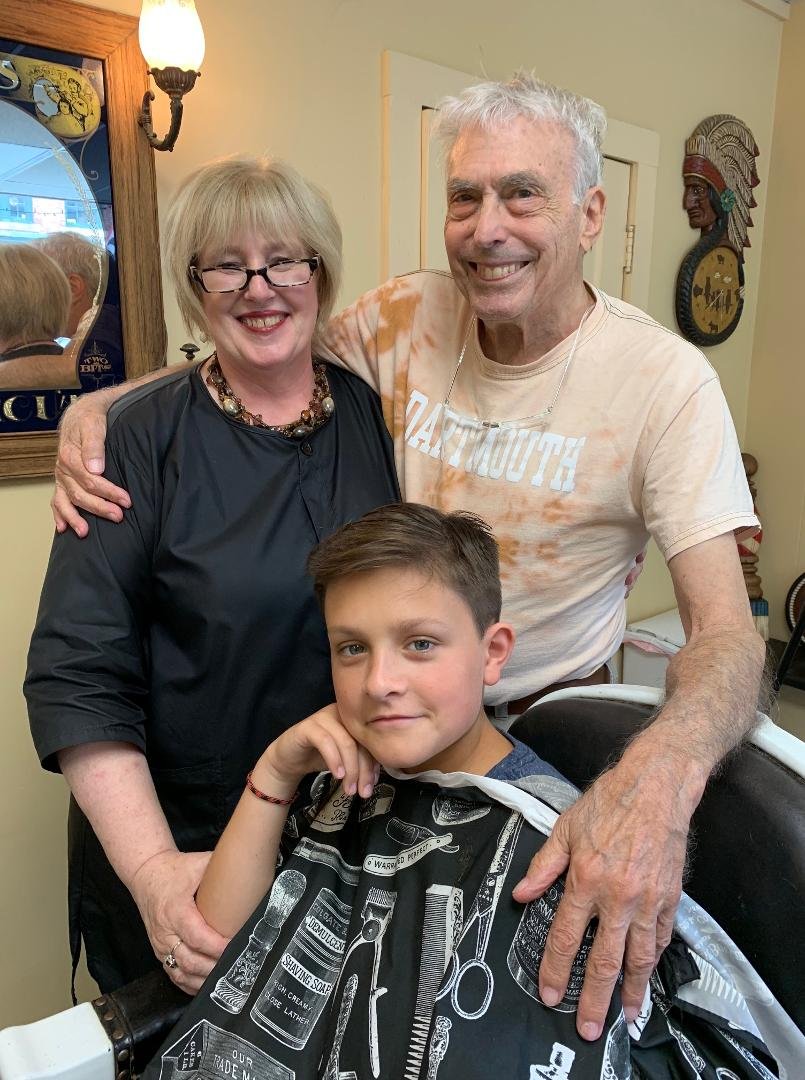 My barber Deb since 1970! Phin and I got haircuts today in White River Junction. I used to go to her for blood letting until it became unfashionable.