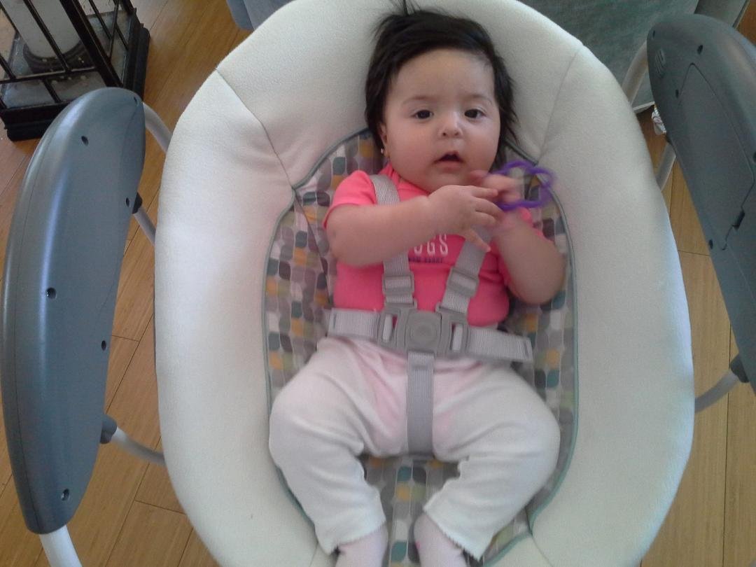 Swinging away and happy.