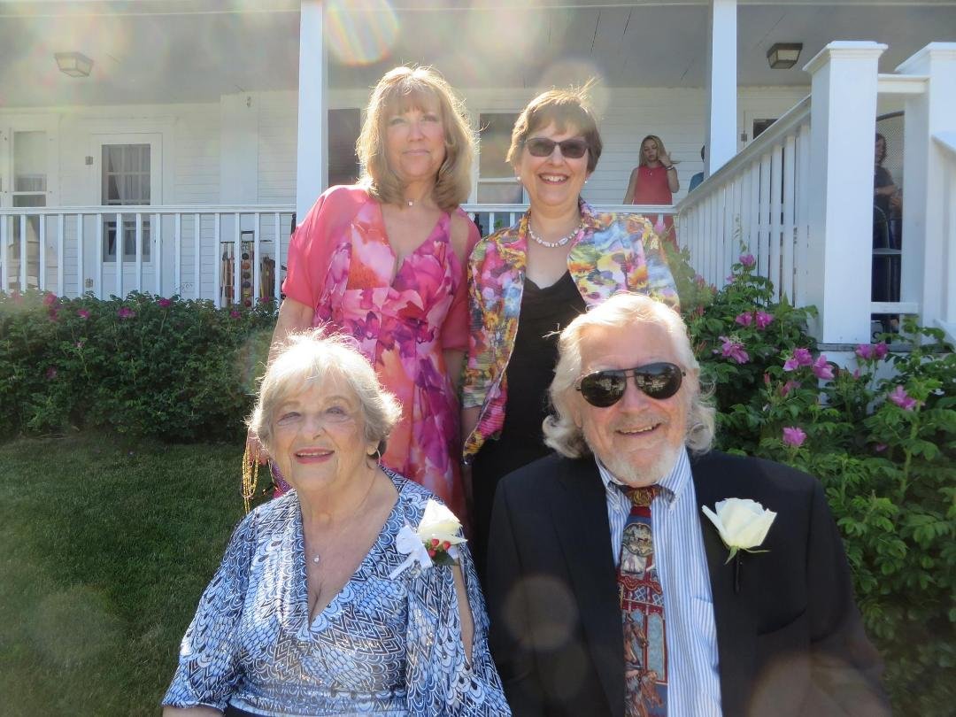 Marvin and me, with our two daughters, at our grandson's wedding in June.
