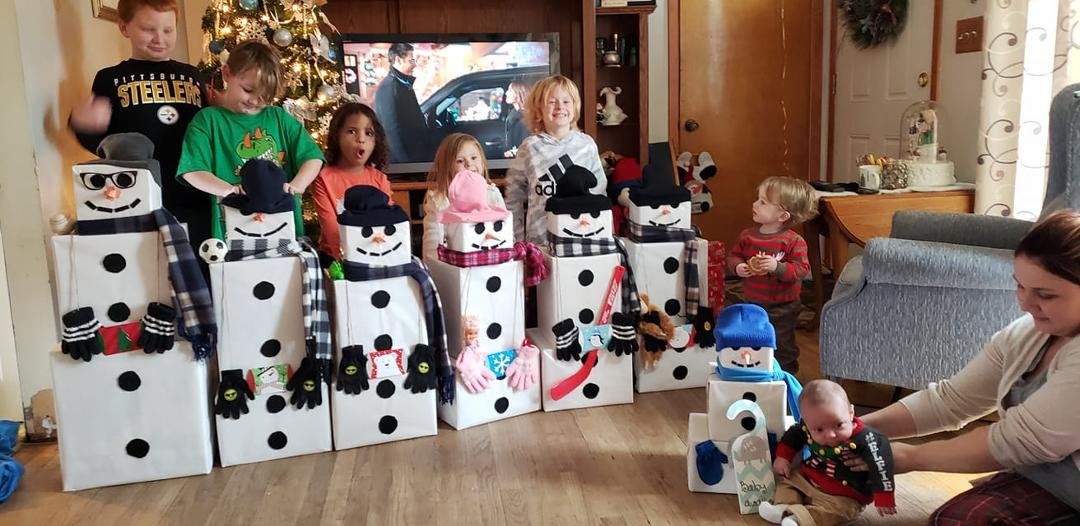 My grandchildren and their snowmen gifts I made them! They loved them!