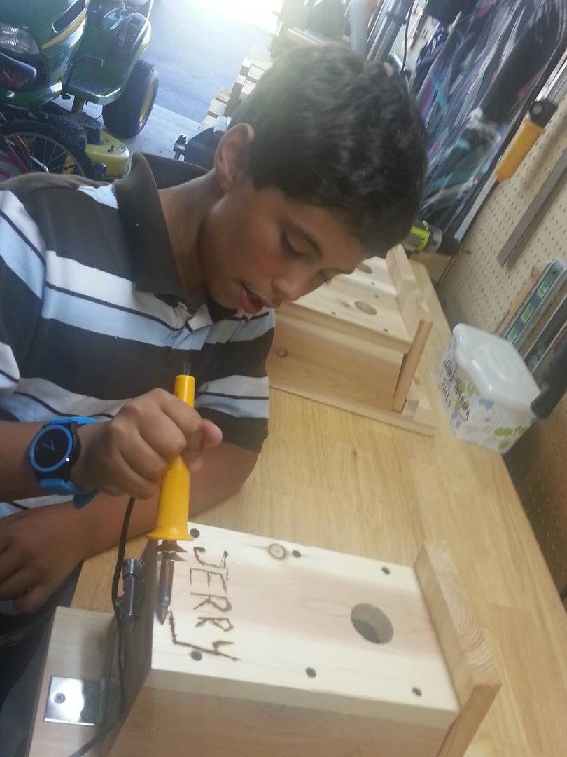Jeremiah finishing his first Bird House