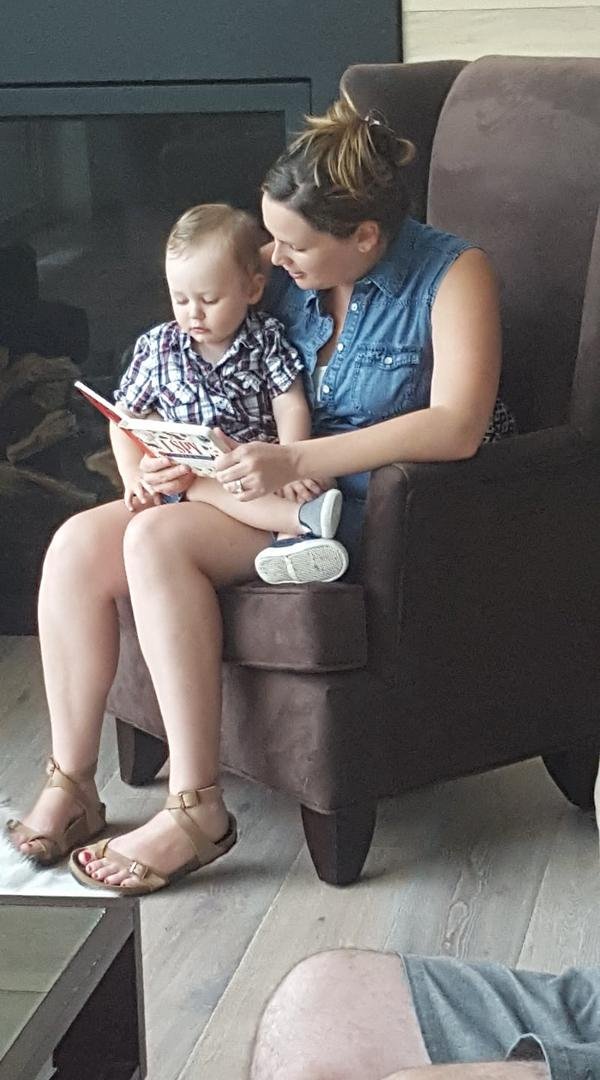My beautiful daughter in law (Carly) and baby Roscoe enjoying book time.